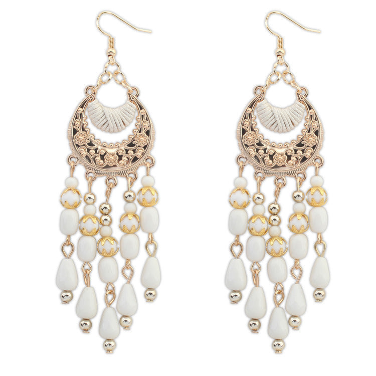 Ethnic style earrings female European and American elegant hand-made water drops tassel earrings Bohemian crescent-shaped earrings